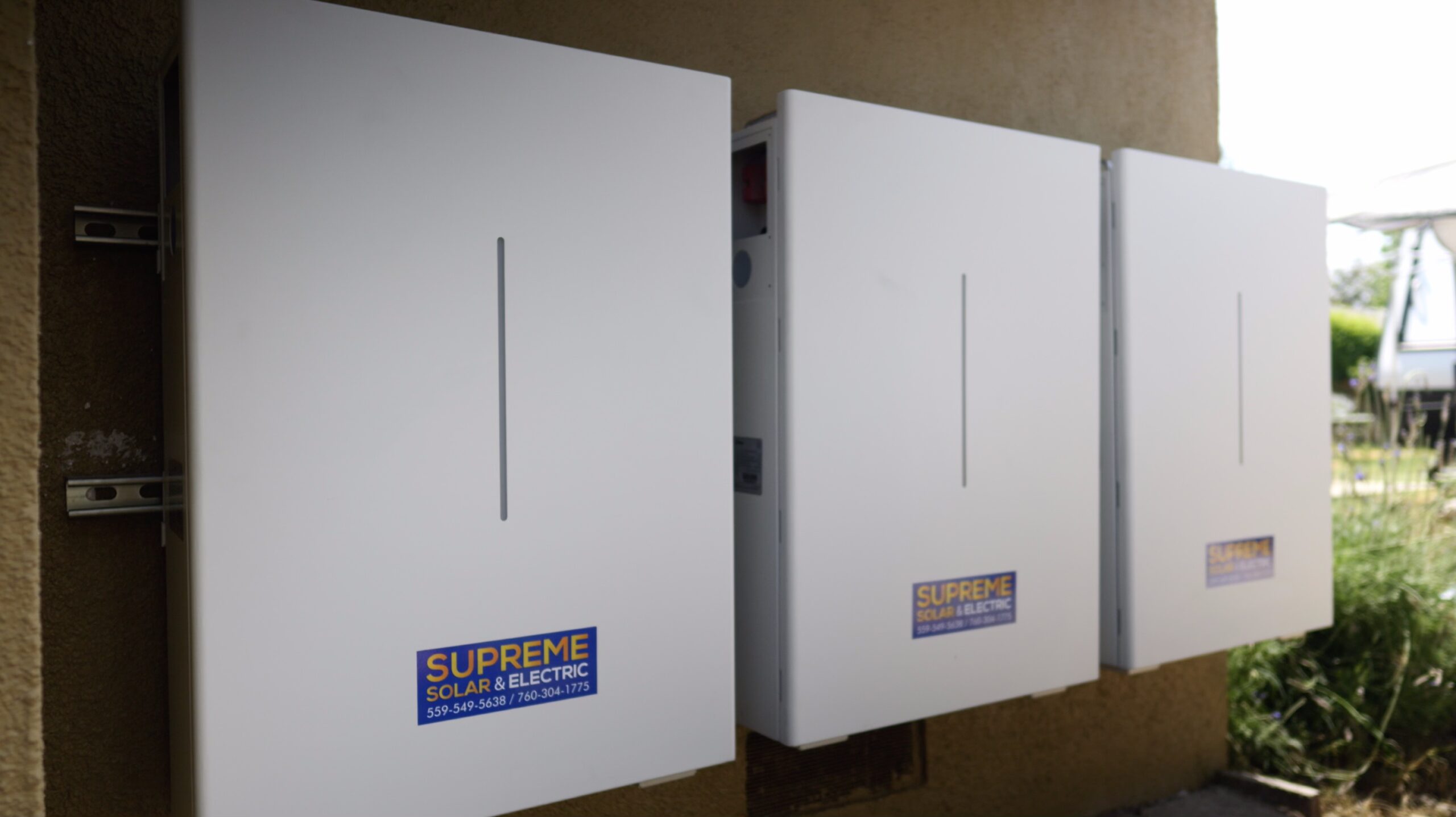 batteries installed on garage wall